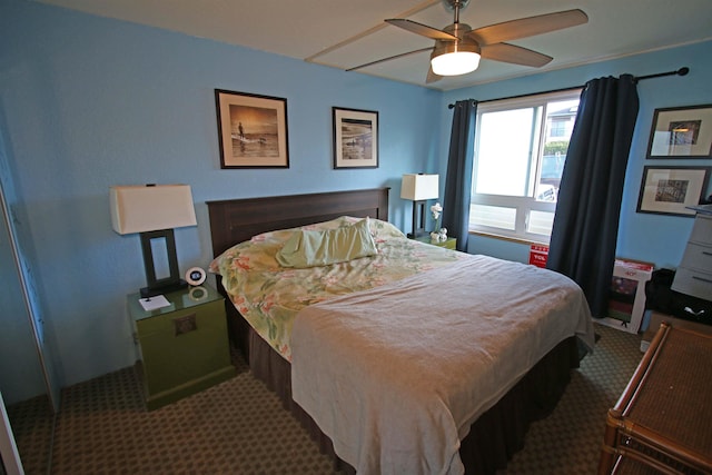 carpeted bedroom with ceiling fan