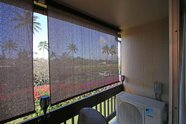 balcony featuring ac unit