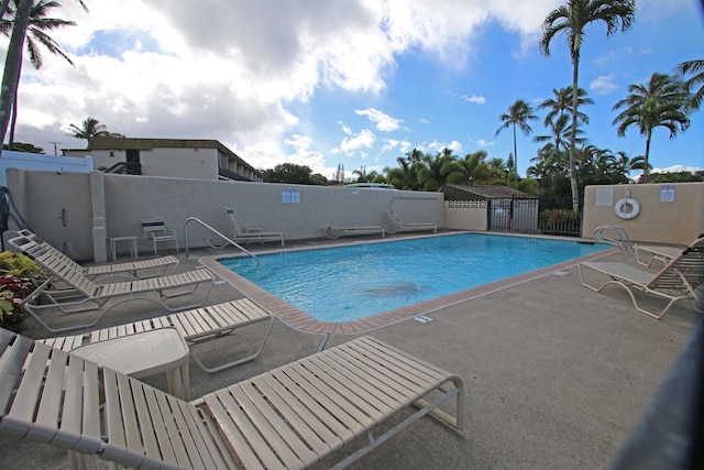 view of pool featuring a patio