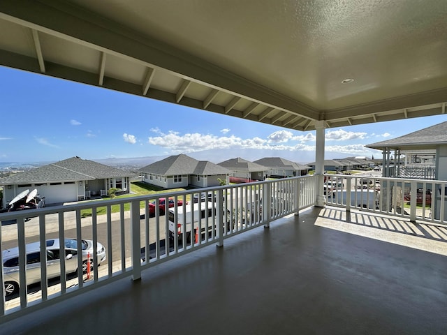 view of patio featuring a balcony