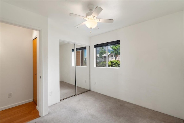 80 Waiaka Ln Unit 37-103, Wailuku, HI 96793 - unfurnished bedroom with carpet flooring, a closet, and ceiling fan