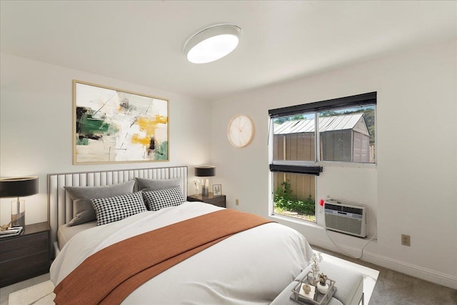 80 Waiaka Ln Unit 37-103, Wailuku, HI 96793 - bedroom with an AC wall unit and carpet floors