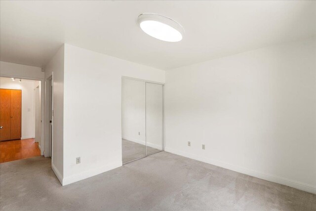 80 Waiaka Ln Unit 37-103, Wailuku, HI 96793 - unfurnished bedroom with carpet and a closet