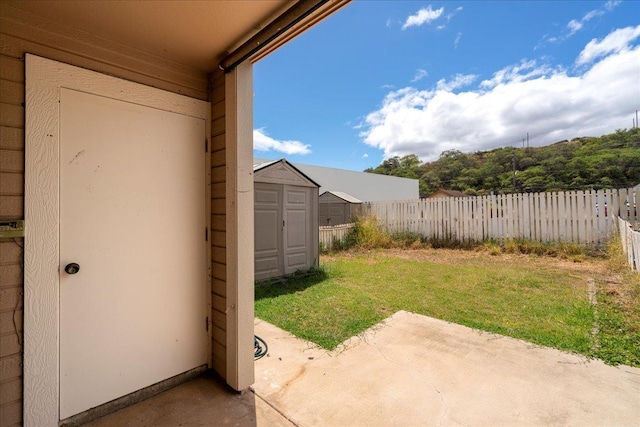 80 Waiaka Ln Unit 37-103, Wailuku, HI 96793 - view of yard featuring a patio area and a shed