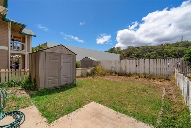 80 Waiaka Ln Unit 37-103, Wailuku, HI 96793 - fenced backyard with a shed and a patio