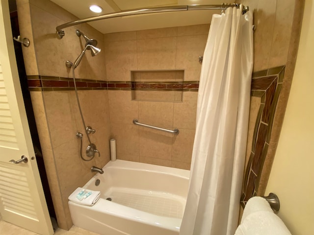 bathroom featuring shower / tub combo with curtain