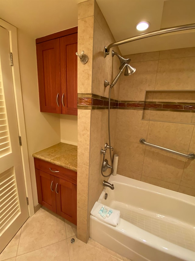 bathroom with tub / shower combination, tile flooring, and vanity