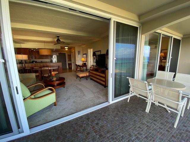 interior space featuring ceiling fan