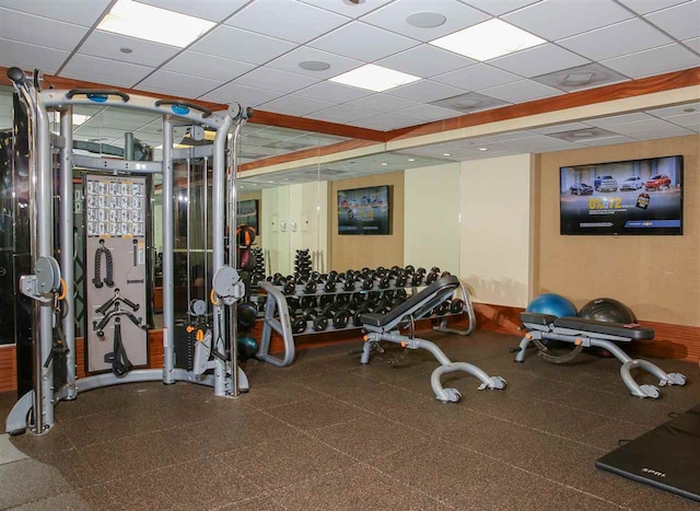 workout area with a drop ceiling