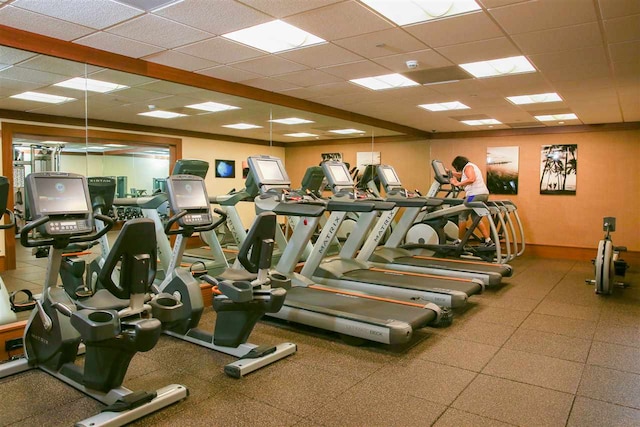 workout area featuring a paneled ceiling