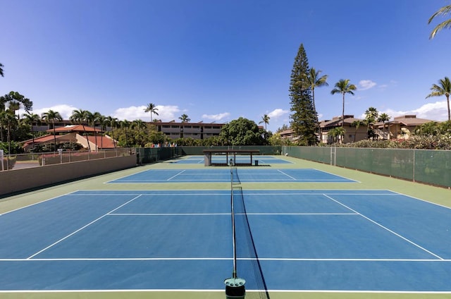 view of sport court featuring community basketball court and fence