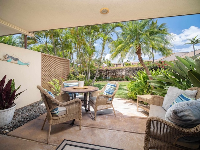 2777 S Kihei Rd Unit K-101, Kihei, HI 96753 - fenced backyard with a patio and outdoor dining area