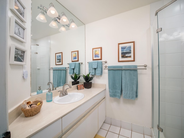 2777 S Kihei Rd Unit K-101, Kihei, HI 96753 - full bathroom with vanity, a stall shower, and tile patterned flooring