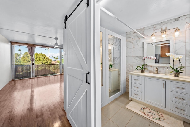 3660 Lower Honoapiilani Rd Unit 306, Lahaina, HI 96761 - bathroom featuring vanity and tile walls