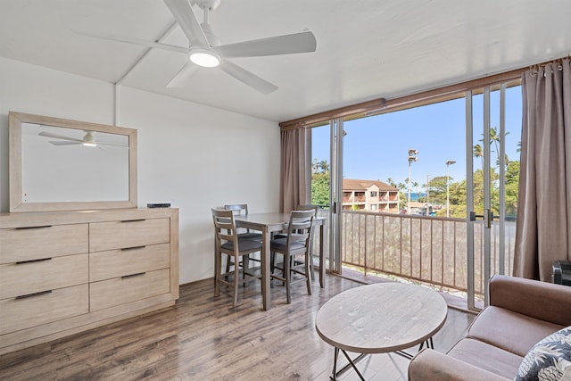 3660 Lower Honoapiilani Rd Unit 306, Lahaina, HI 96761 - dining area featuring ceiling fan and wood finished floors