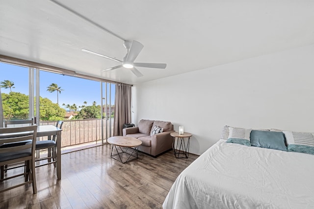 3660 Lower Honoapiilani Rd Unit 306, Lahaina, HI 96761 - bedroom with wood finished floors and ceiling fan