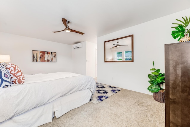 bedroom with an AC wall unit, carpet, and ceiling fan