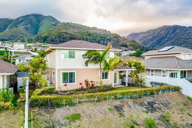 view of front of home featuring a mountain view