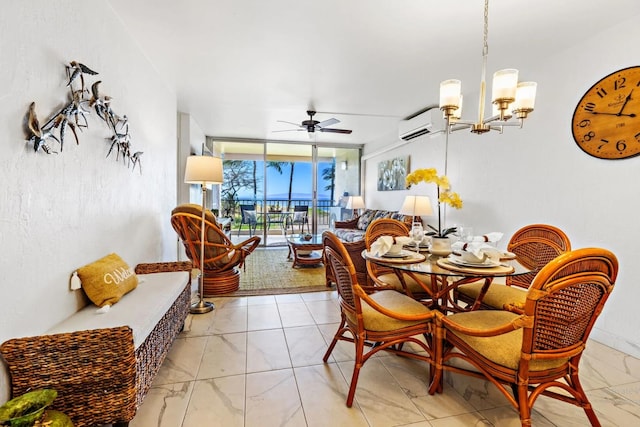 dining space with a wall unit AC, ceiling fan with notable chandelier, and a wall of windows