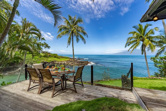 wooden deck with a water view