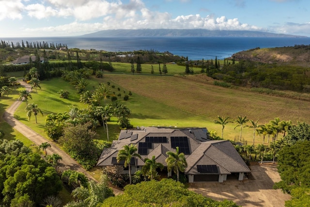 aerial view featuring a rural view and a water and mountain view