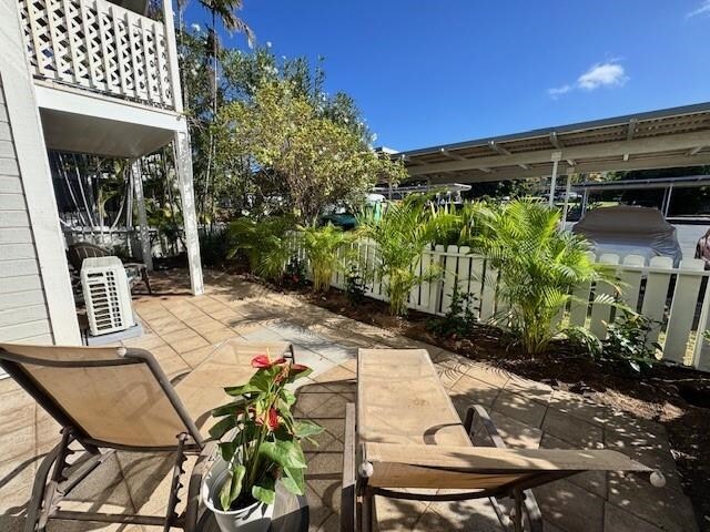160 Keonekai Rd Unit 9-102, Kihei, HI 96753 - view of patio / terrace featuring a balcony