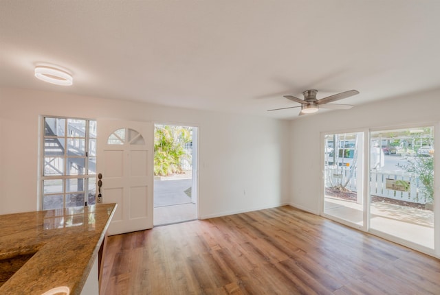 160 Keonekai Rd Unit 9-102, Kihei, HI 96753 - entryway with hardwood / wood-style floors and ceiling fan