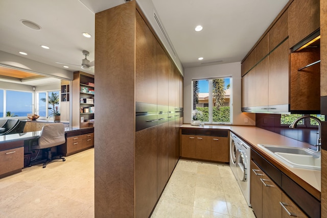 kitchen with recessed lighting, a sink, a ceiling fan, tasteful backsplash, and built in desk