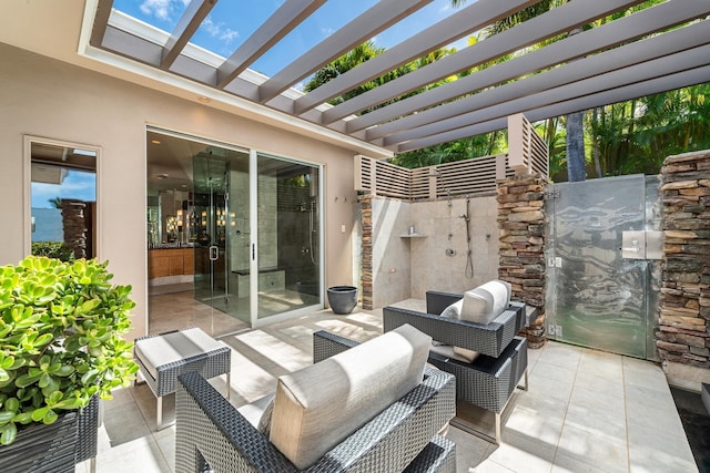 view of patio with an outdoor living space and a pergola