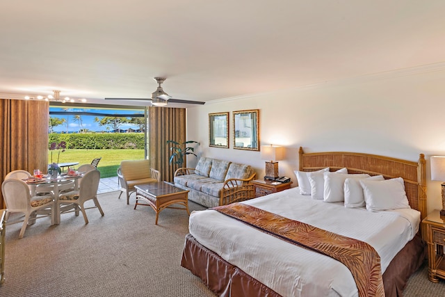 carpeted bedroom with ceiling fan, access to exterior, and crown molding