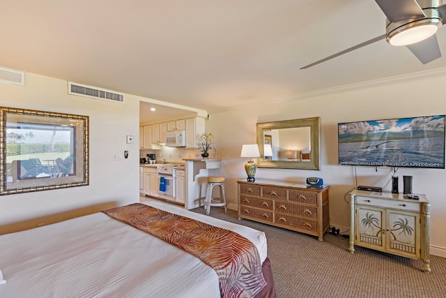 bedroom with visible vents, ceiling fan, carpet, and ornamental molding