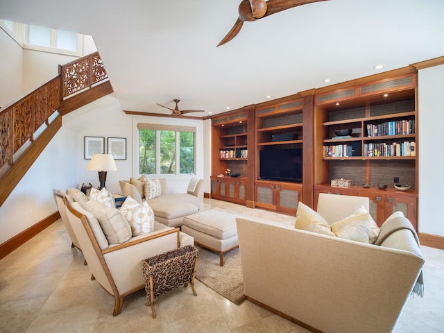 tiled living room with built in shelves and ceiling fan