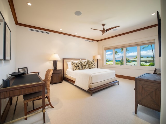 carpeted bedroom with crown molding and ceiling fan