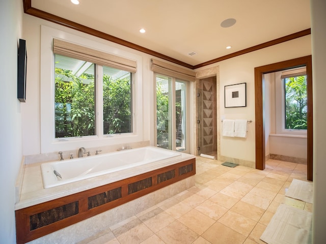 bathroom featuring plenty of natural light, plus walk in shower, and tile patterned floors