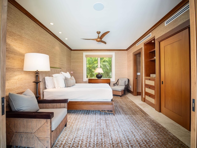 carpeted bedroom with crown molding and ceiling fan