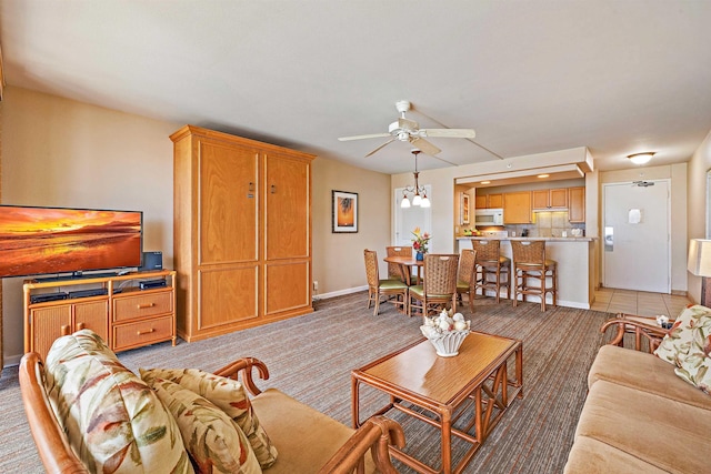 4327 Lower Honoapiilani Rd Unit 1002B, Lahaina, HI 96761 - living room featuring light colored carpet, ceiling fan, and baseboards