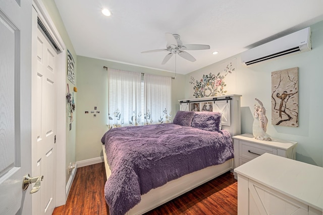 bedroom featuring recessed lighting, a ceiling fan, dark wood-type flooring, and a wall unit AC