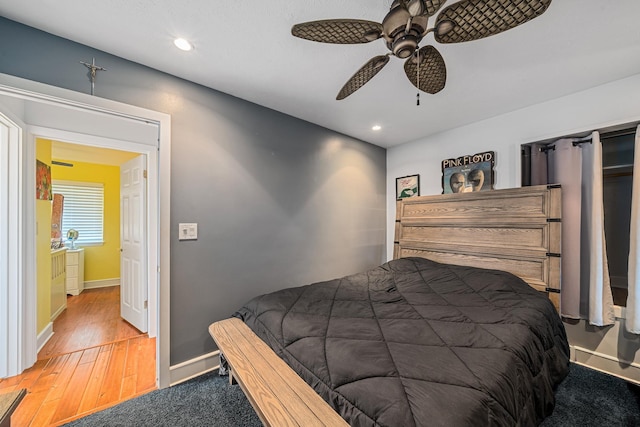 bedroom with recessed lighting, baseboards, wood finished floors, and a ceiling fan