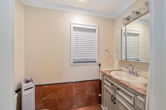 bathroom with vanity and crown molding