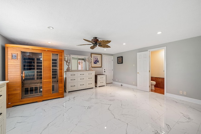 unfurnished bedroom featuring recessed lighting, baseboards, and marble finish floor