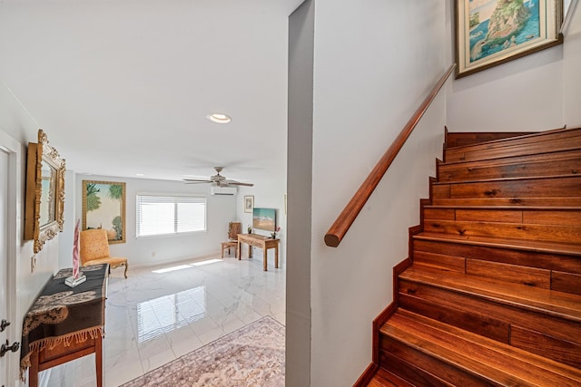 stairs featuring recessed lighting, a ceiling fan, marble finish floor, and baseboards