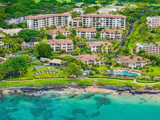 bird's eye view with a beach view and a water view
