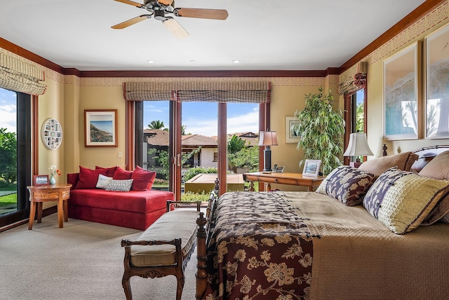 carpeted bedroom featuring multiple windows, ceiling fan, and ornamental molding