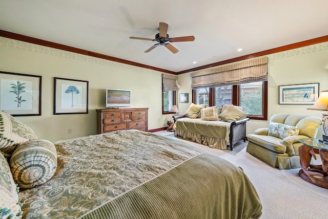 carpeted bedroom featuring crown molding and ceiling fan