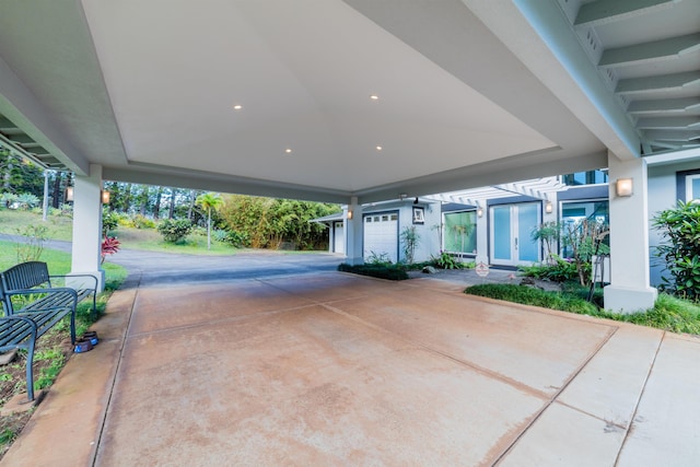 view of patio featuring a garage