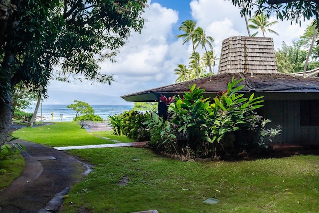 view of yard with a water view