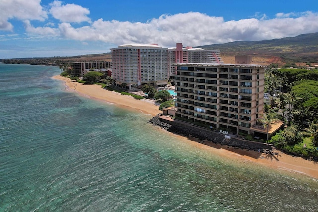 aerial view featuring a water view and a beach view