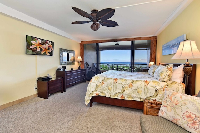 bedroom with access to exterior, ceiling fan, carpet, and ornamental molding