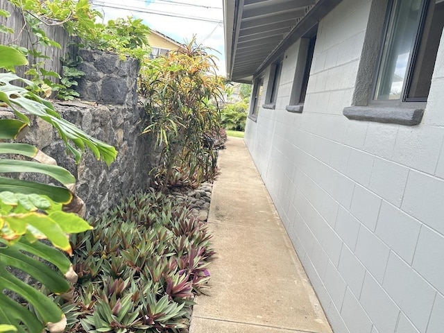 550 Kailana St, Wailuku, HI 96793 - view of side of home featuring concrete block siding