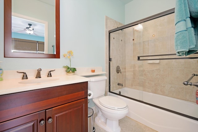bathroom featuring vanity, ceiling fan, bath / shower combo with glass door, and toilet